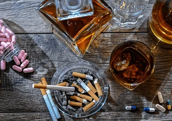 Addictive substances including whiskey, cigarettes and pills